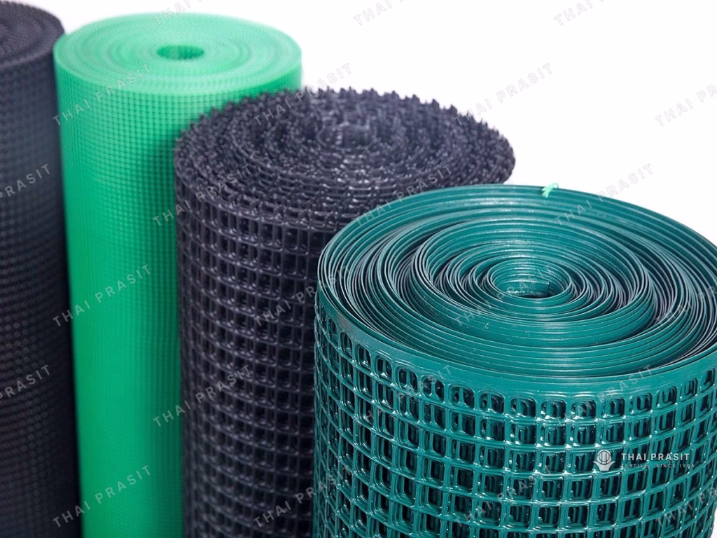 Rolls of square mesh in green and black