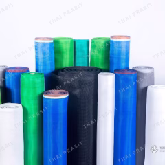 Rolls of screen netting standing in a row