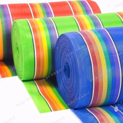 Rolls of woven fabric in several colours